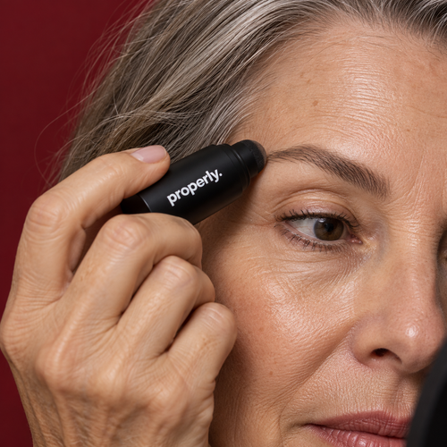 Properly brow stamp applied to a naturally defined mature brow